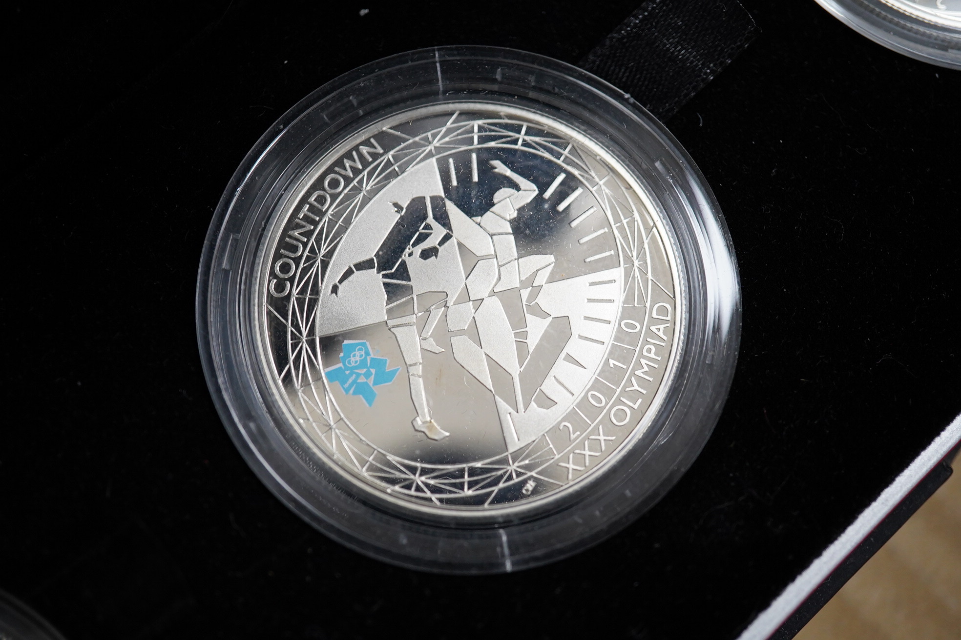 Royal Mint UK proof silver coins , to include five countdown to London 2012 £5 coins 1997, 2008 and 2005 £2 coins, Golden Jubilee 2002 commemorative silver medal 2013 and 2001 £1 coins, all cased, most with certificates